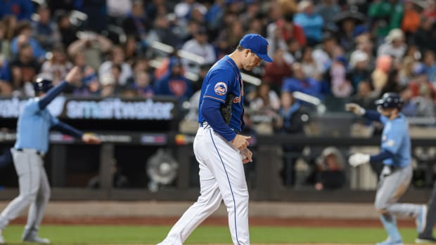 May 17, 2023; New York City, New York, USA; New York Mets relief pitcher Adam Ottavino (0) reacts after giving up a two run home run to Tampa Bay Rays second baseman Brandon Lowe (8) during the seventh inning at Citi Field.
